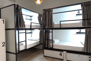 12-bed shared room with private bathroom at Way Hostel Madrid, spacious and bright, ideal for large groups and social travelers