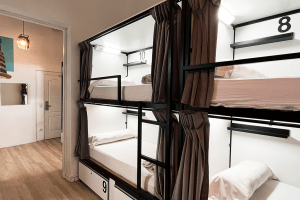 12-bed shared room with shared bathroom, spacious and comfortable for large groups at Way Hostel Madrid