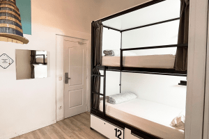 Interior view of the 12-bed shared room with shared bathroom in the center of Madrid