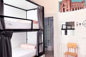6-bed shared room with private bathroom at Way Hostel Madrid, ideal for groups or backpackers
