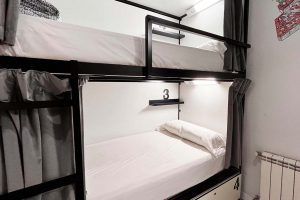 8-bed shared room with private bathroom at Way Hostel Madrid, spacious and comfortable for groups