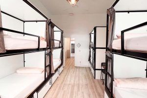 Bunk beds in an 8-bed shared room with private bathroom at Way Hostel Madrid