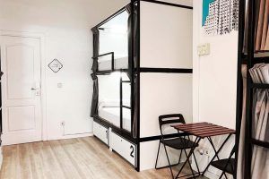 Common area within the 8-bed shared room with private bathroom
