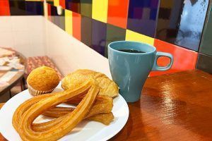 Breakfast with coffee and churros, complimentary for guests of Way Hostel Madrid