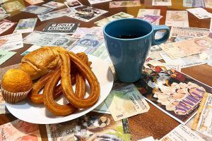 Churros and coffee served at Way Hostel Madrid, a perfect addition to breakfast