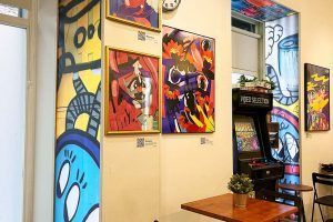 Artistic murals and colorful decor in the common areas of Way Hostel Madrid