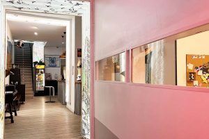 Entrance to Way Hostel Madrid, showcasing the cozy and modern atmosphere