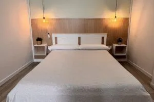 Bright triple room with private bathroom at Way Hostel Madrid, ideal for groups or families